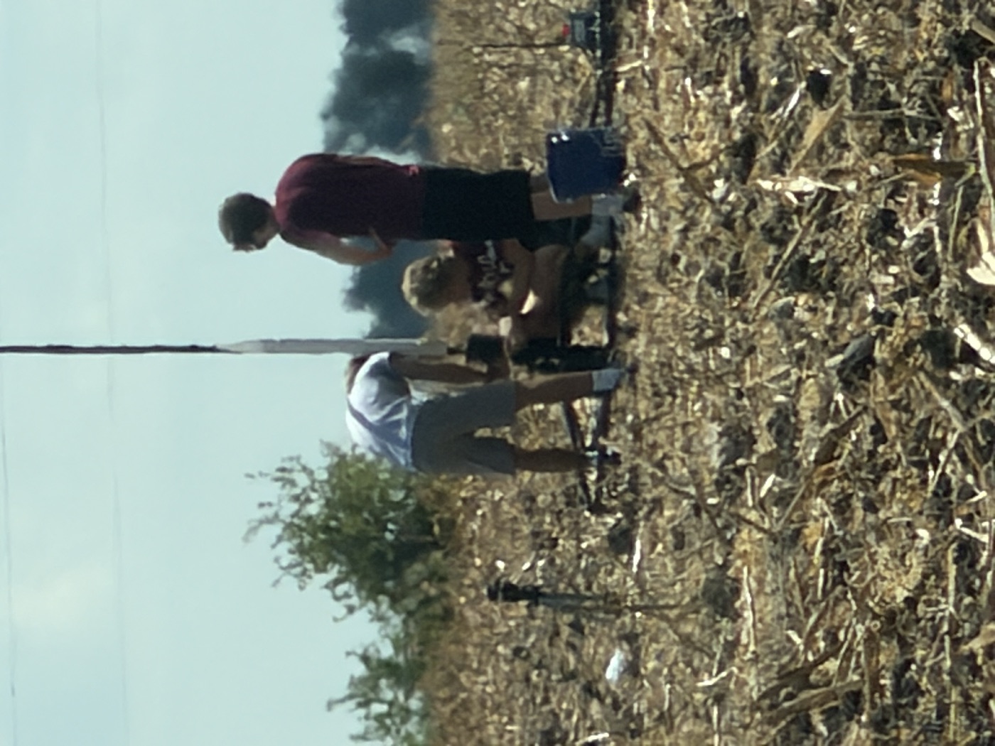 Club members wiring a rocket on the pad