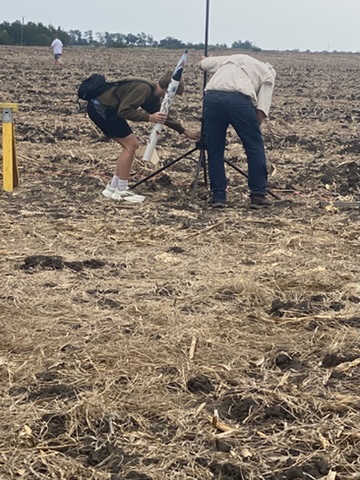 Noah sliding his rocket onto the launch rail